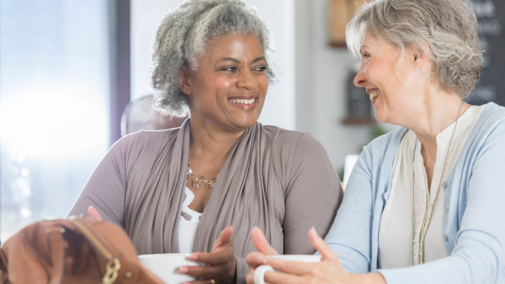 two female friends chatting over coffee