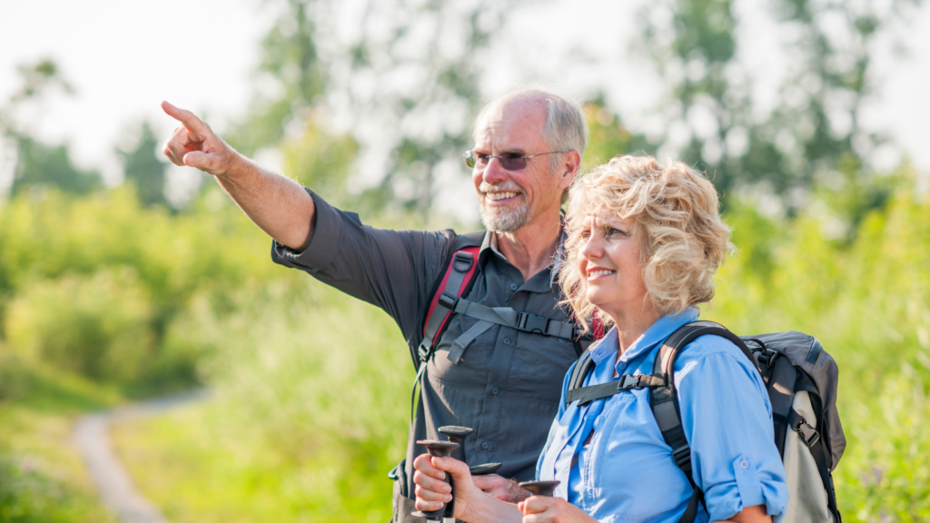 An older couple out on a walk in the countryside
