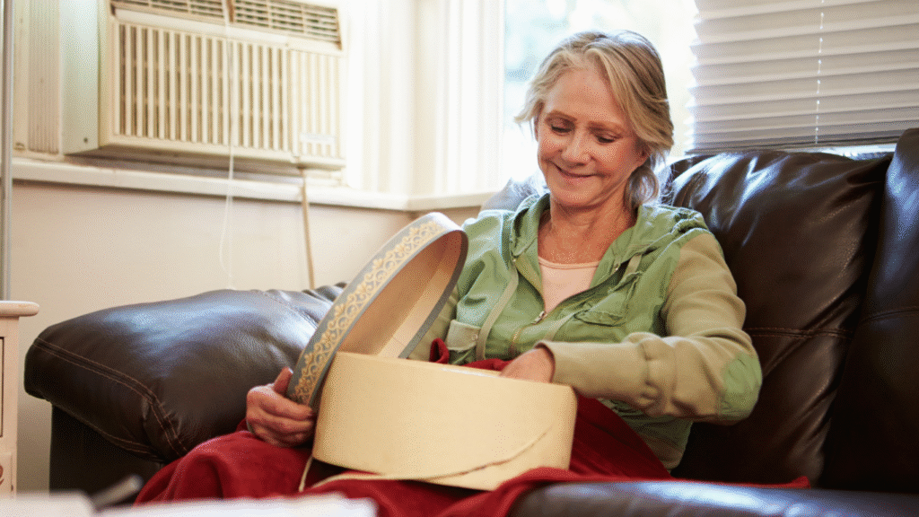 woman looking through memory box for dementia