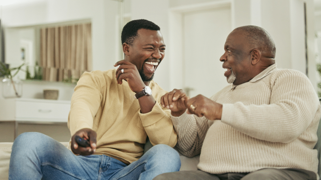 father and son together enjoying dementia friendly activity