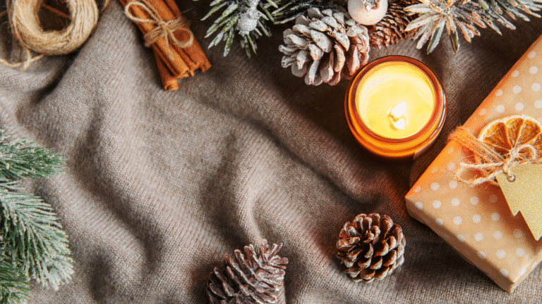winter scene with candles and fir cones as a cosy indoor activity idea for dementia