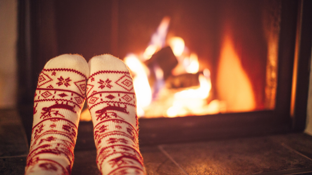 socks in front of fire for stress free winter activities